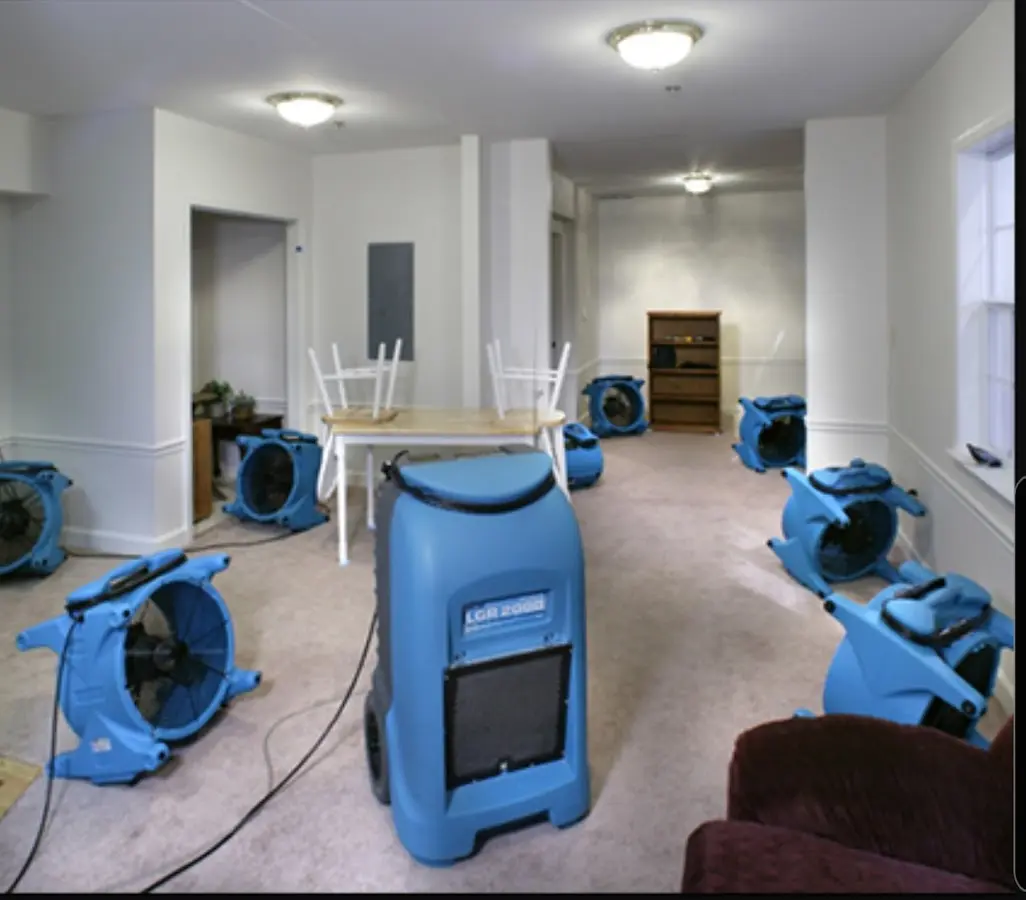 Air movers and dehumidifier setup for Water Damage Restoration in Oak Creek